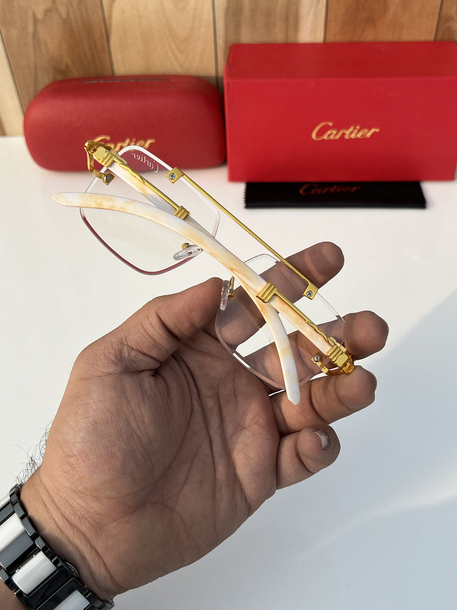 Cartier_9063_gold_plano
