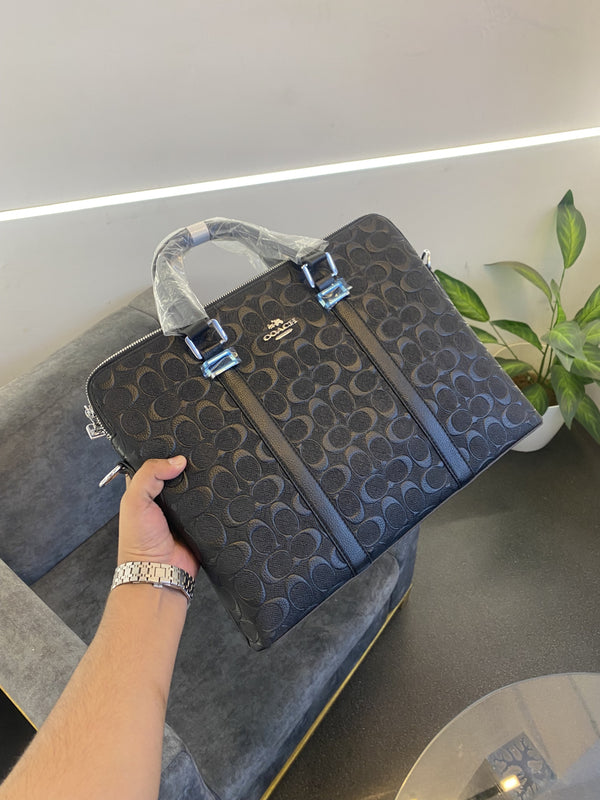 Coach monogram leather laptop bag with double zip and back zip pocket