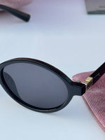 Miu_miu_5519_black_gold