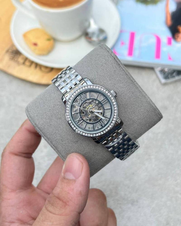 Fossil Delphi Automatic full silver