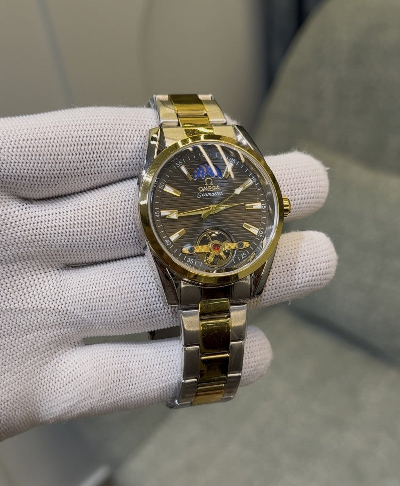 Omega_TwoTone_BlackDial_Battery