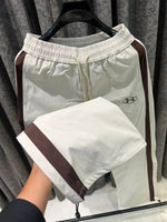 UNDER ARMOR IMPORTED STORE ARTICLE TRACK PANT