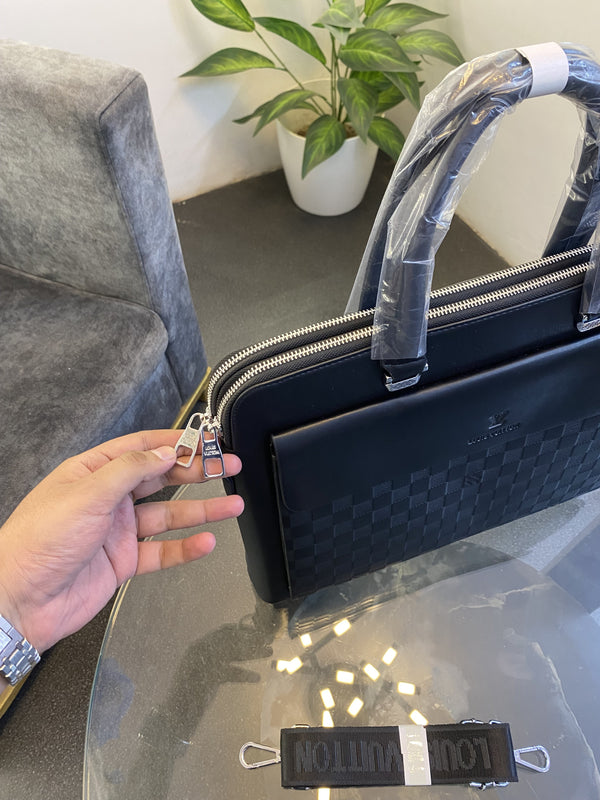 Louis Vuitton monogram front pocket with double zip and back zip pocket laptop bag black