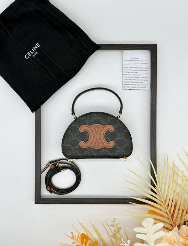 CELINE HALF MOON CASE IN TRIOMPHE CANVAS AND CALFSKIN