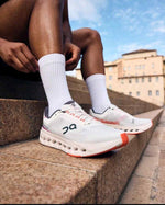 ON Cloudsurfer Next running trainers in white and red 539