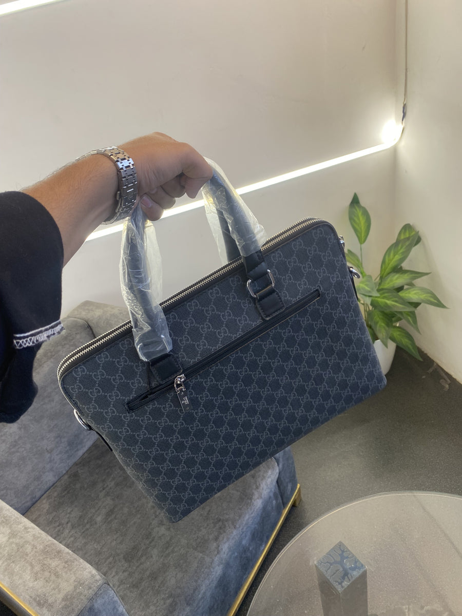 Gucci Imported leather laptop bag with double zip back zip and strap black silver