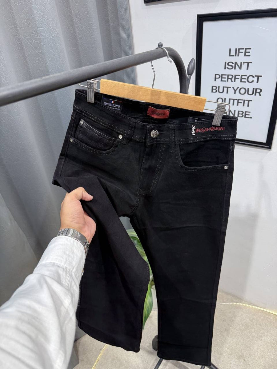 YSL boot cut imported jet black denim with brand buttons and packing