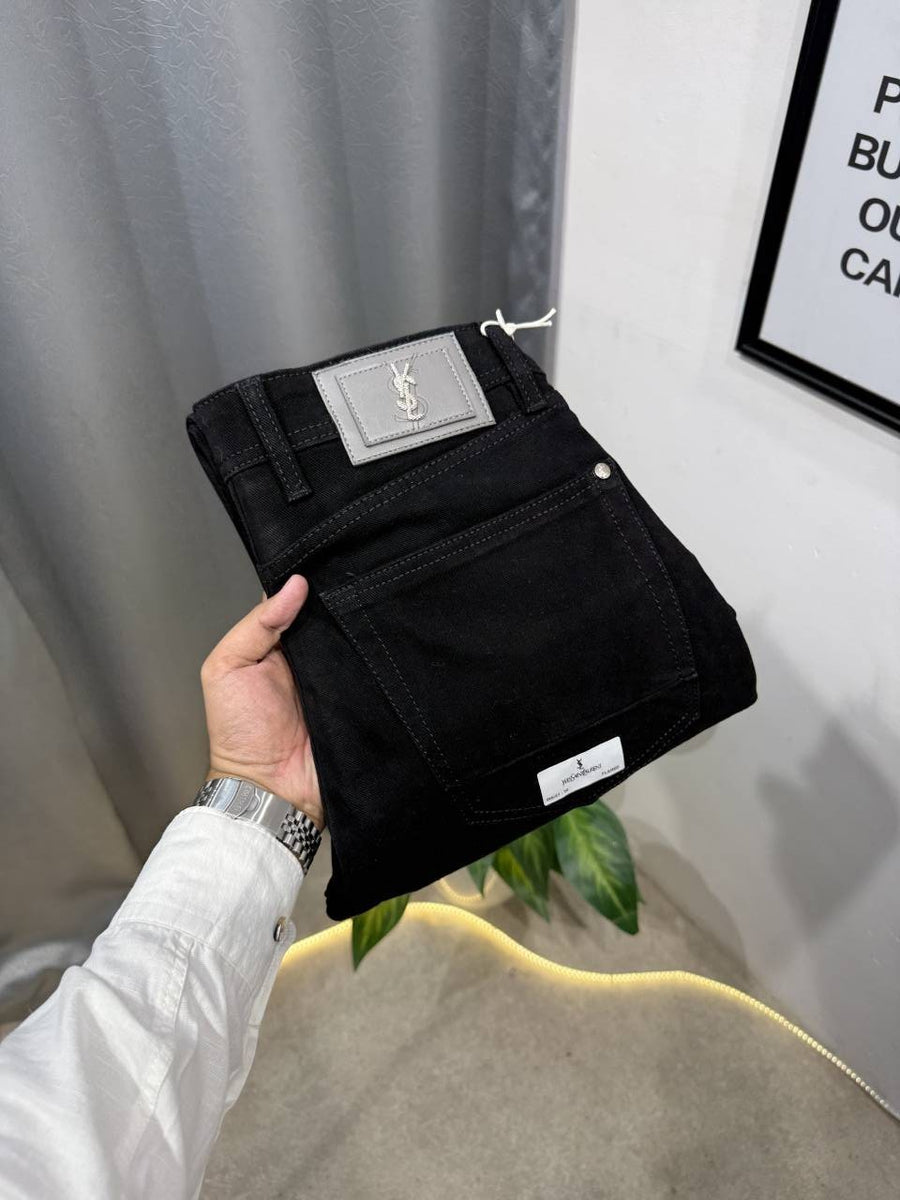 YSL boot cut imported jet black denim with brand buttons and packing