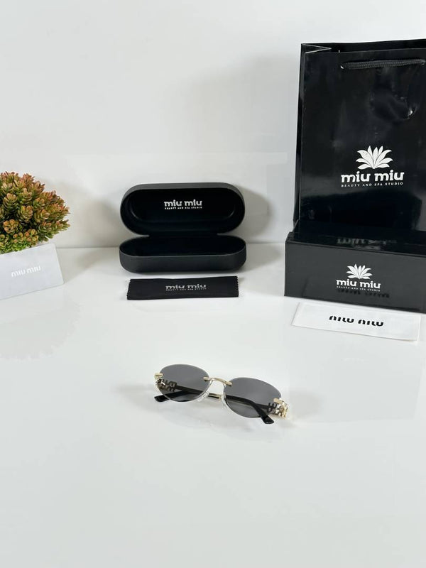 Miu Miu WMNS 1025 Gold Black