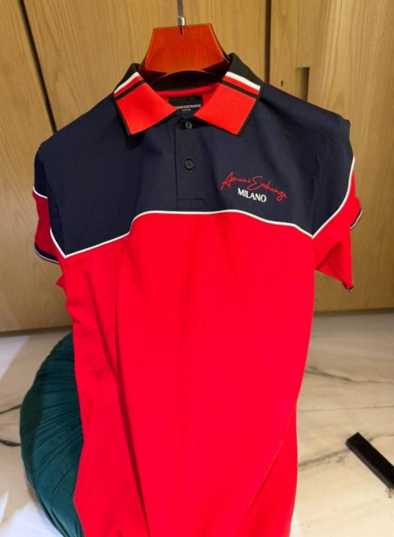 x i exchang e IMPORTED STORE ARTICLE POLO T SHIRTx