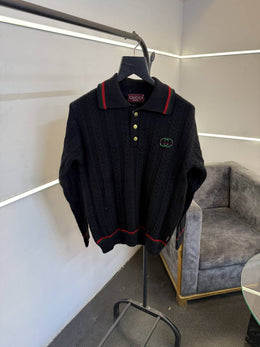 Gucci black knitted imported sweatshirt with brand button and logo on chest