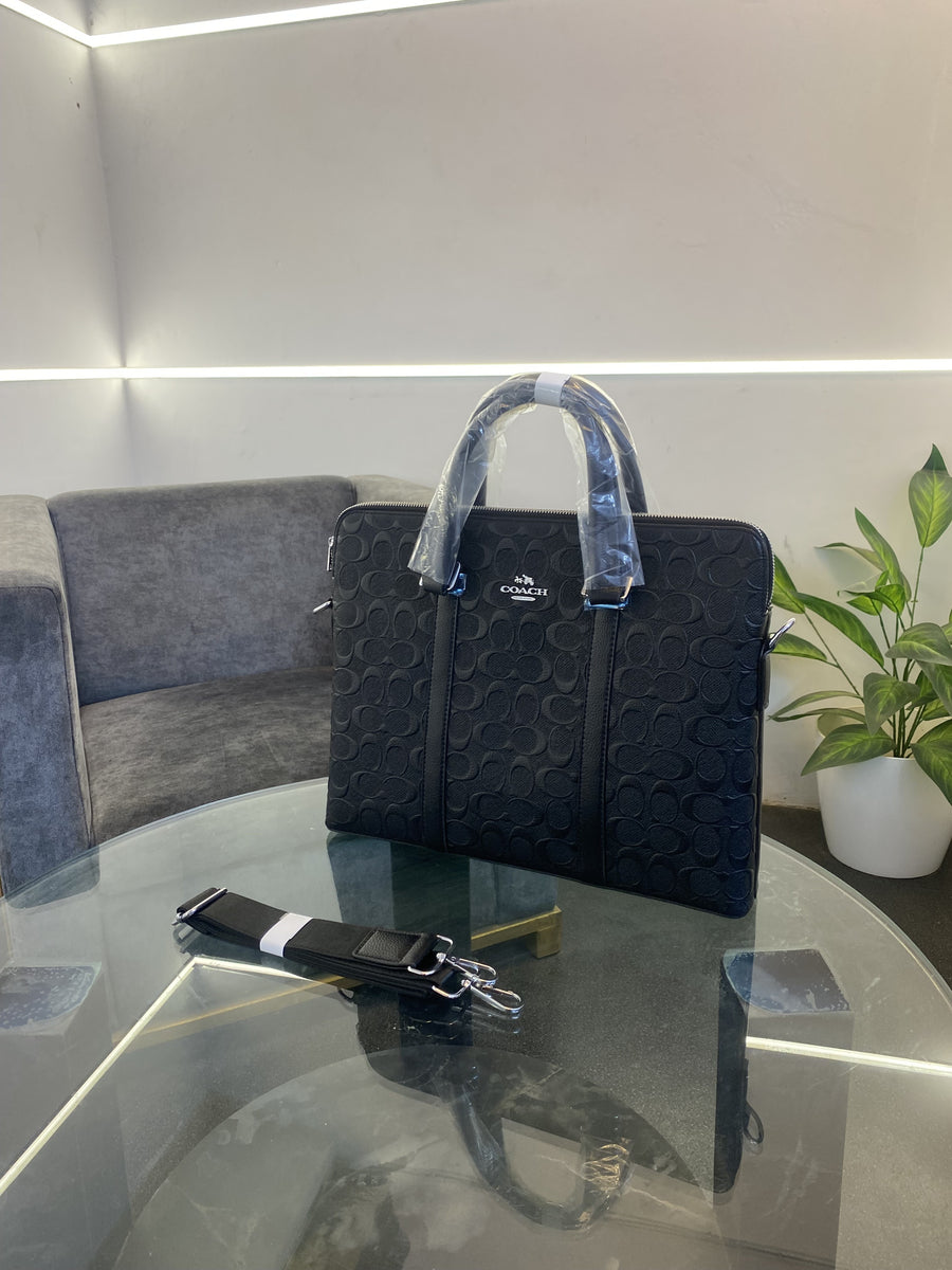 Coach monogram leather laptop bag with double zip and back zip pocket