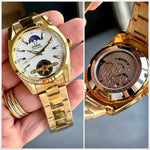 Omega_GoldWhite_Battery