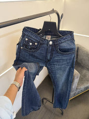 True religion hyperflex blue imported denim with brand button and pattern on back