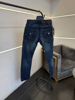 True religion hyperflex blue imported denim with brand button and pattern on back