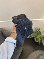 True religion hyperflex blue imported denim with brand button and pattern on back