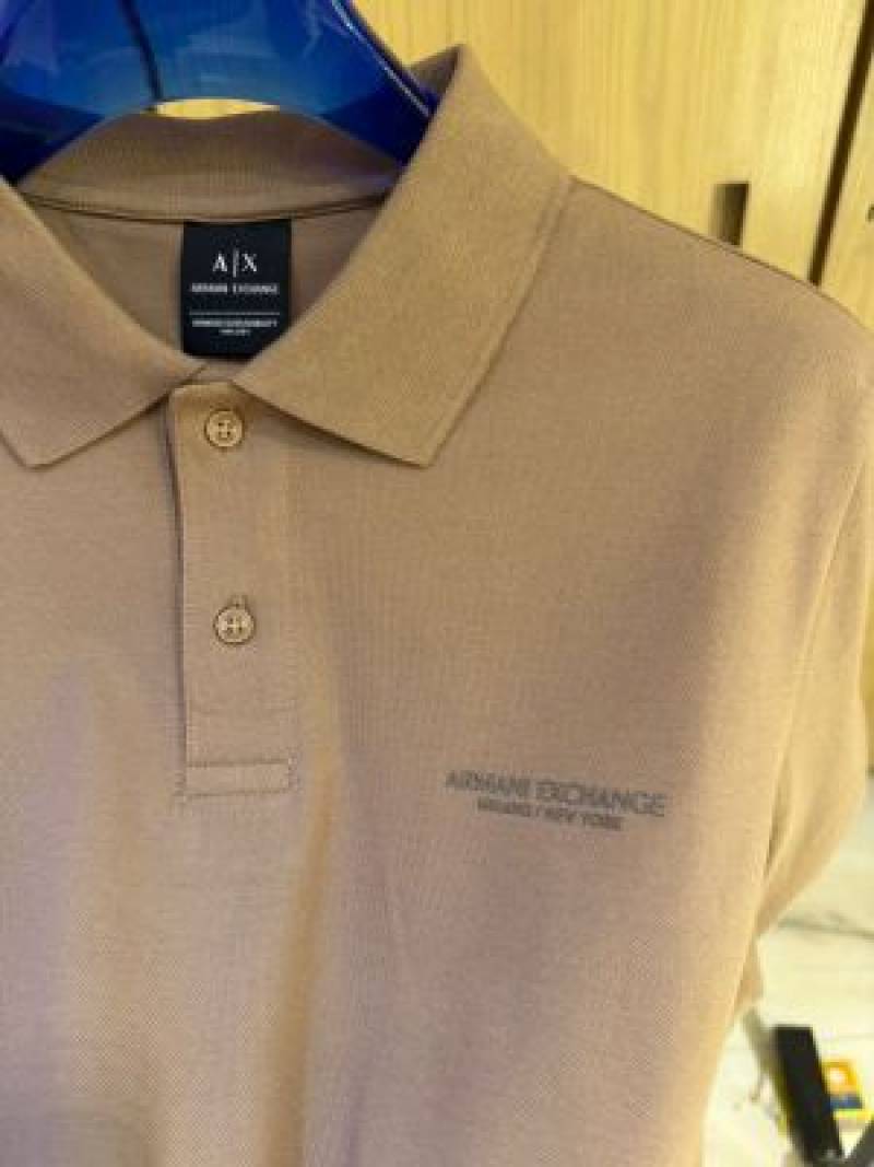 Exchang e IMPORTED STORE ARTICLE POLO T SHIRTx