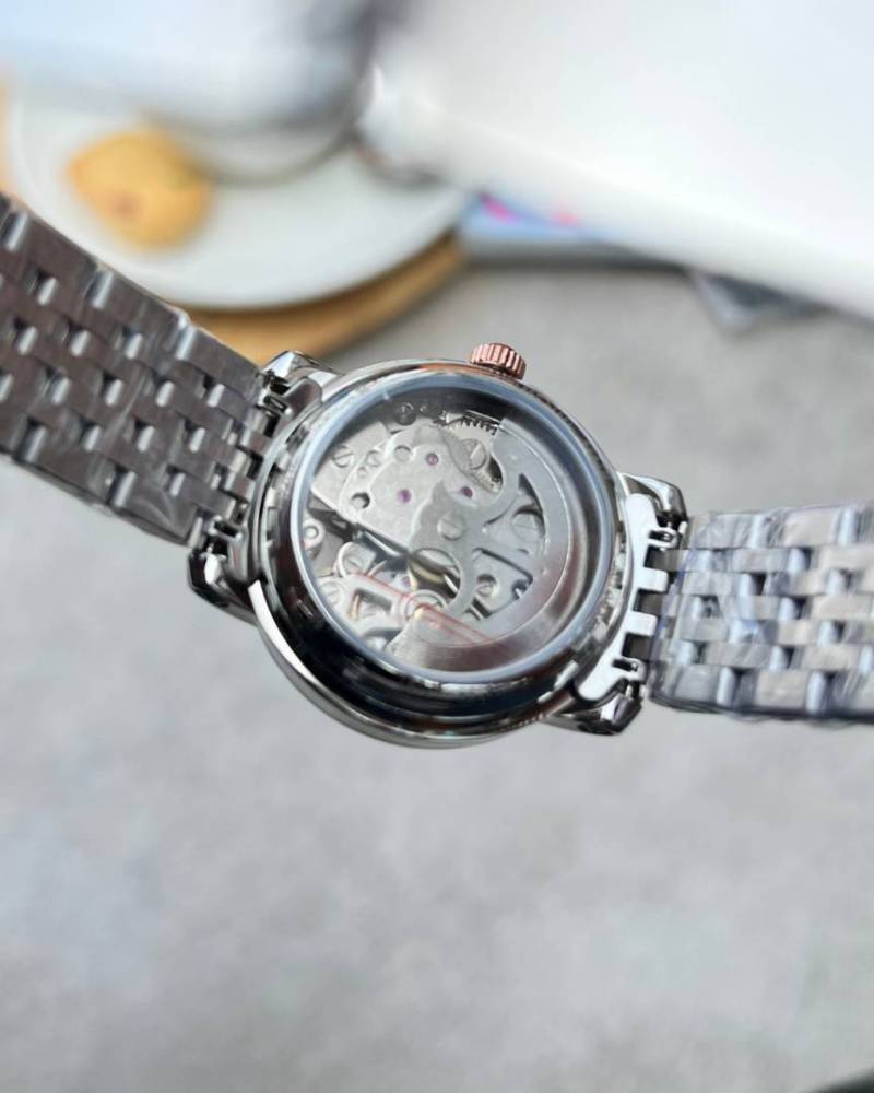 Fossil Delphi Automatic full silver