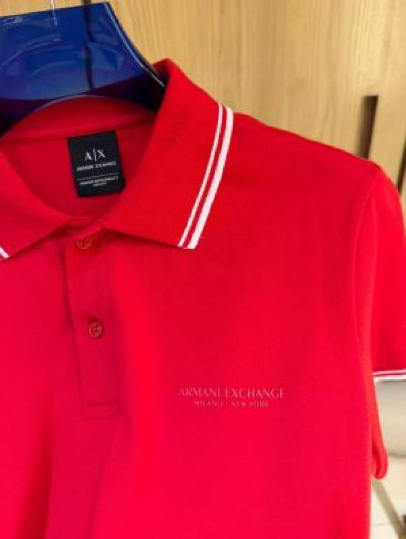 Exchang e IMPORTED STORE ARTICLE POLO T SHIRTx