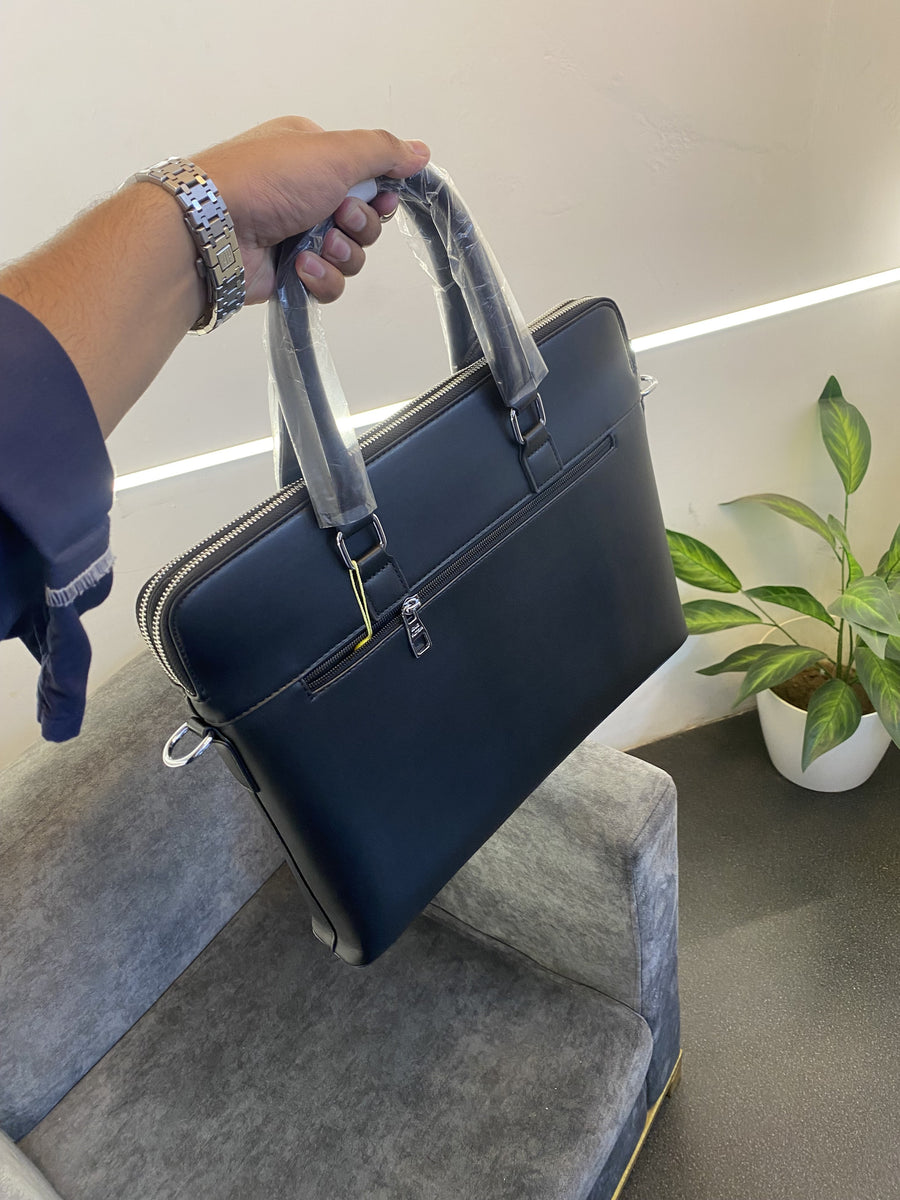 Louis Vuitton monogram front pocket with double zip and back zip pocket laptop bag black