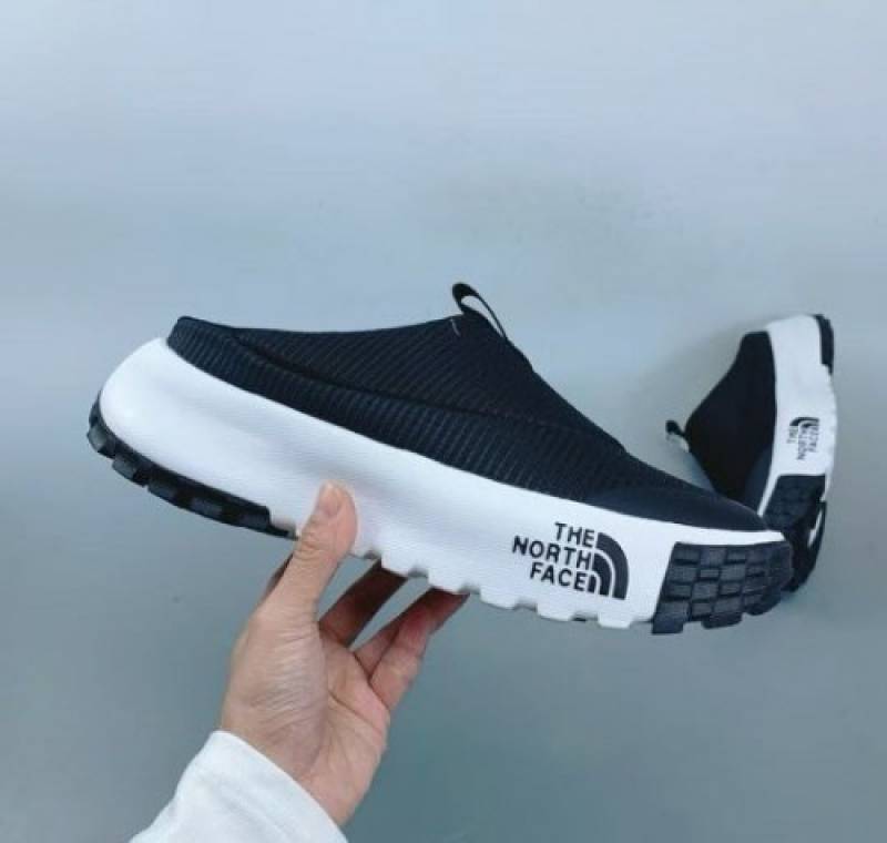 The North Fasee Never Stop Mule Black White