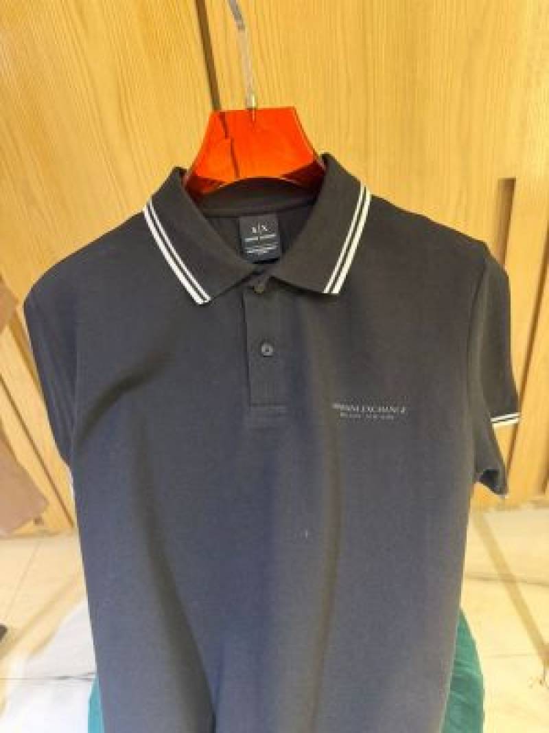 Exchang e IMPORTED STOcRE ARTICLE POLO T SHIRx