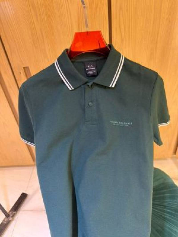 Exchang e IMPORxTED STORE ARTICLE POLO T SHIRT