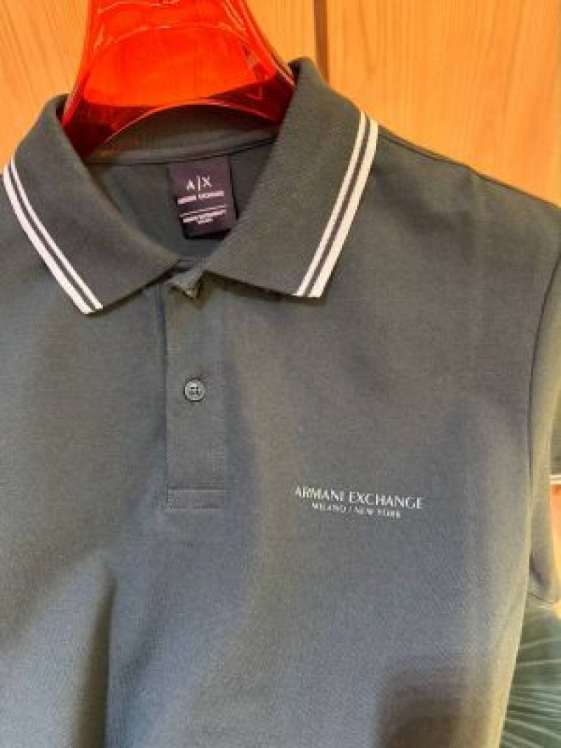 Exchang e IMPORxTED STORE ARTICLE POLO T SHIRT