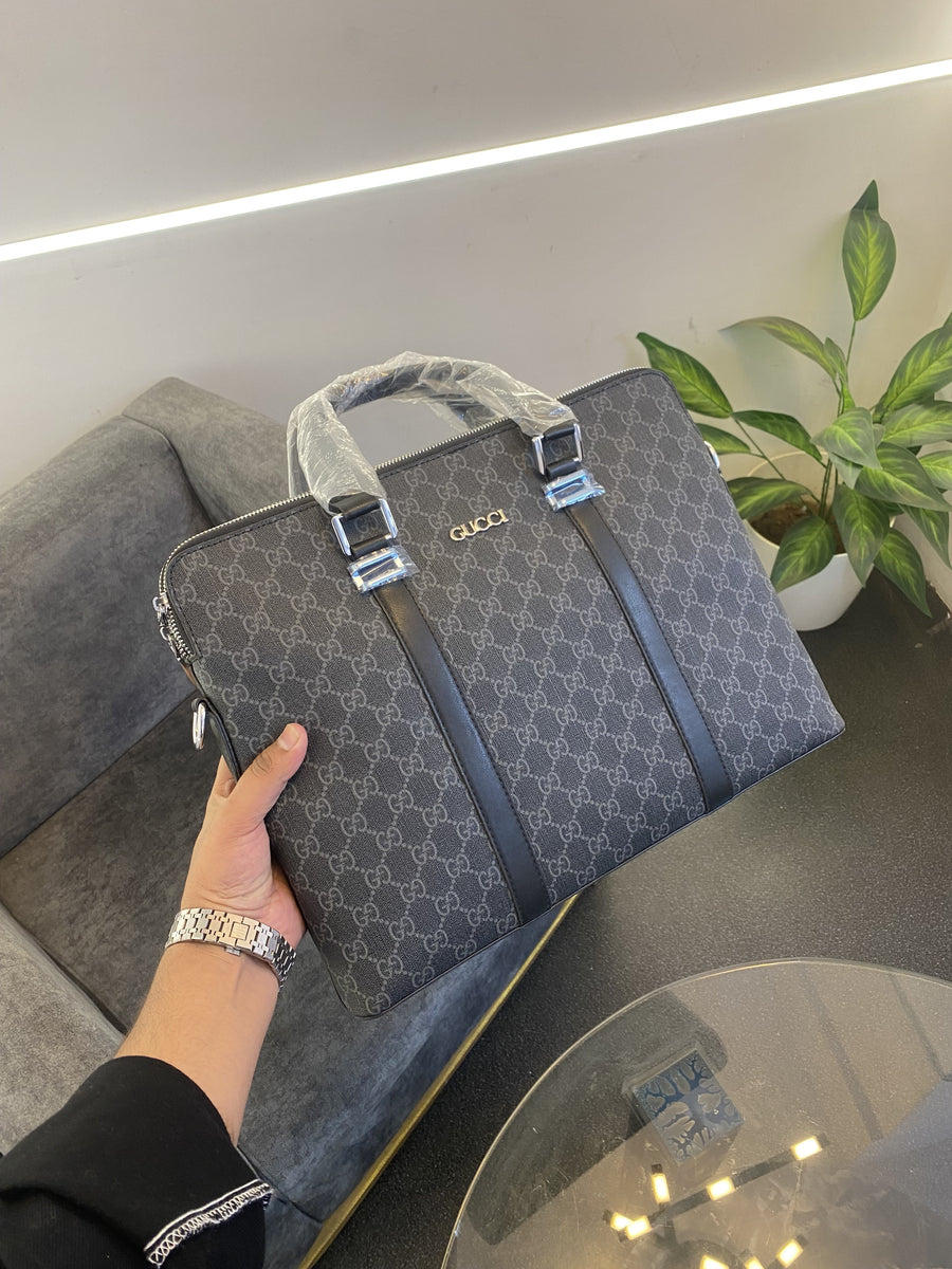 Gucci Imported leather laptop bag with double zip back zip and strap black silver