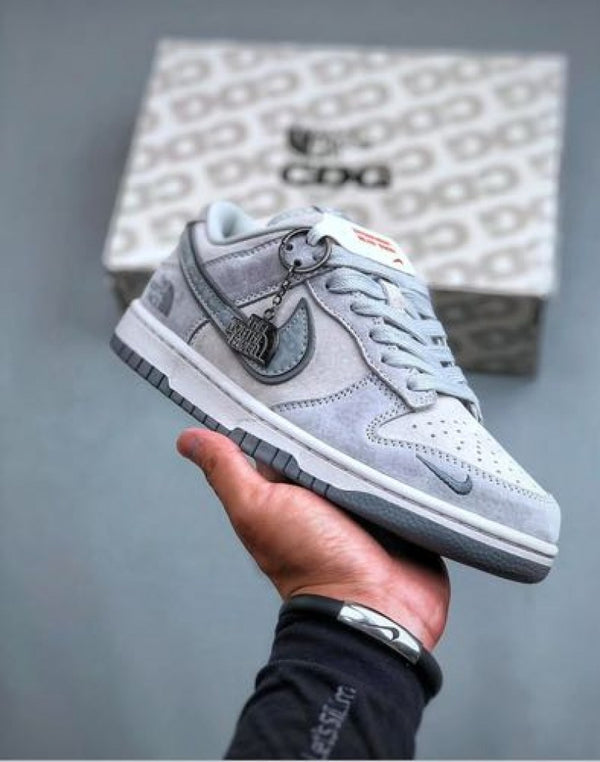 Nike sb dunk low x the north fase