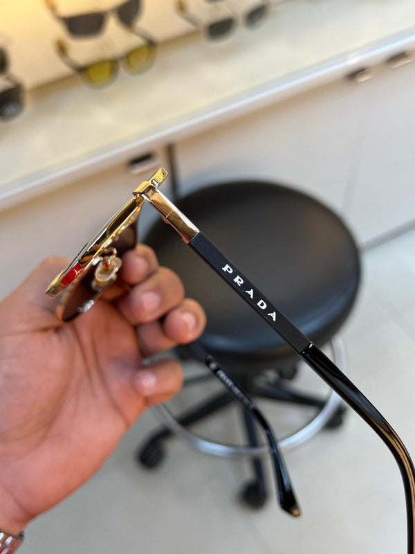 Prada_132_aviator_gold_black