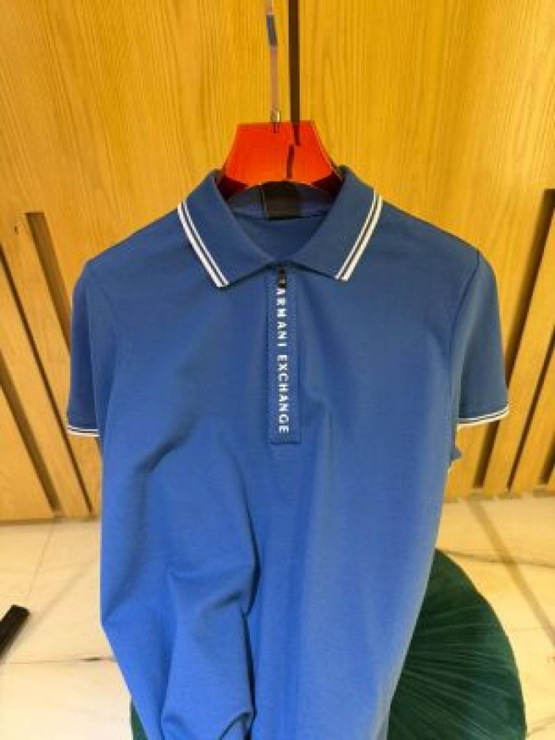 Exchang e IMPORTED STORE ARTICLE POLO T SHIRTx