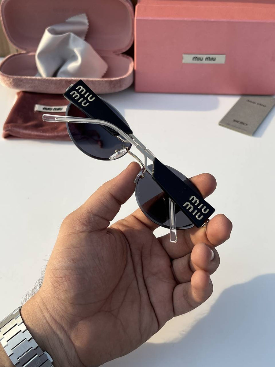Miu_miu_4070_gold_black