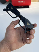 Prada_955_black_plano