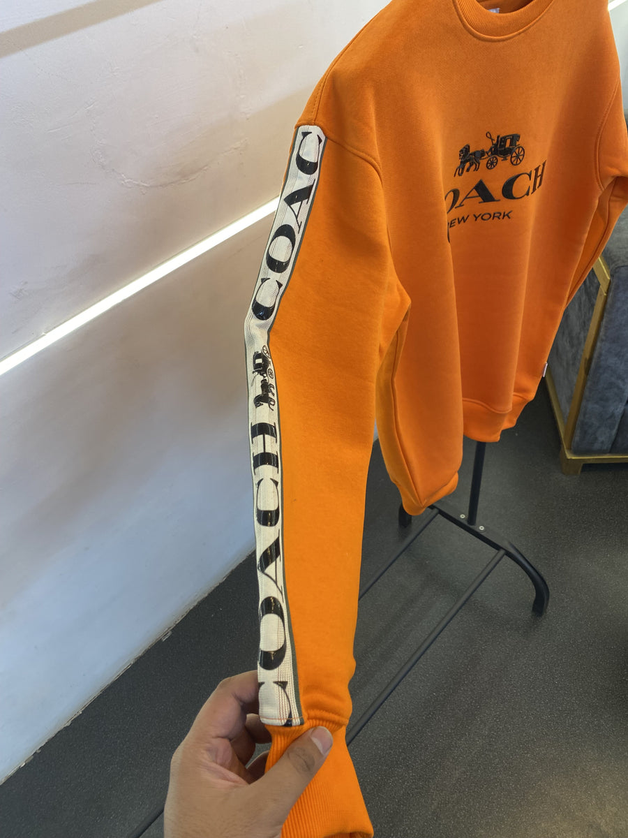 Coach heavy gsm lycra fleece sweatshirt with silicon brand tape on sleeves and front orange