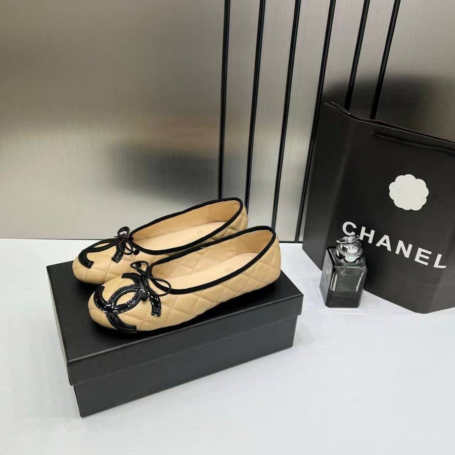 Chanel_Quilted_Cambon_Leather_Ballet_Flats_In_Apricot_Beige_Black_Toe_Bow_With_OG_Box_&_Carry_Bag
