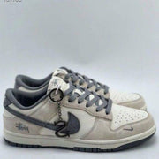 dunk low x stussy rice white carbon 384